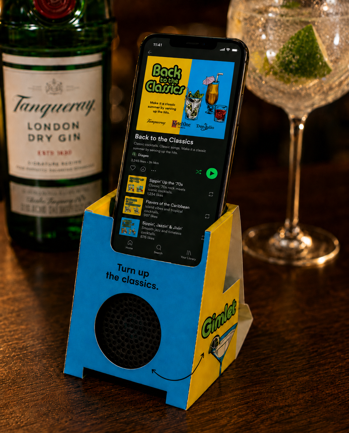 Branded cardboard phone amp at bar